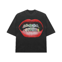 a black t - shirt with teeth on it